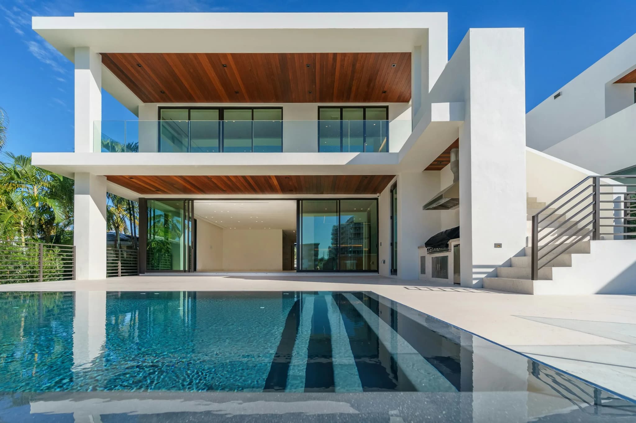 Luxury white estate home with premium exterior finishes